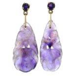 A pair of early 20th century gold carved amethyst drop earrings.