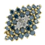 A 9ct gold diamond and 'blue' diamond cluster ring.One 'blue' diamond deficient.