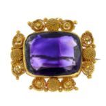 A mid 19th century gold amethyst cannetille brooch.Amethyst calculated weight 14cts,