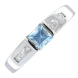 A 9ct gold diamond and blue gem ring.Estimated total diamond weight 0.10ct.