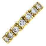 An 18ct gold diamond seven-stone ring.Estimated total diamond weight 0.50ct.