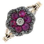 A late 19th century silver and gold ruby and diamond floral cluster ring.One diamond chipped.