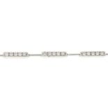 An 18ct gold brilliant-cut diamond bracelet, with bar-link spacers.