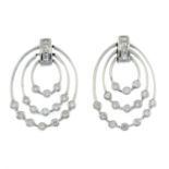 A pair of diamond drop earrings.Estimated total diamond weight 0.35ct.