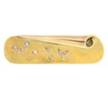 An early 20th century gold diamond brooch.Length 5.4cms.