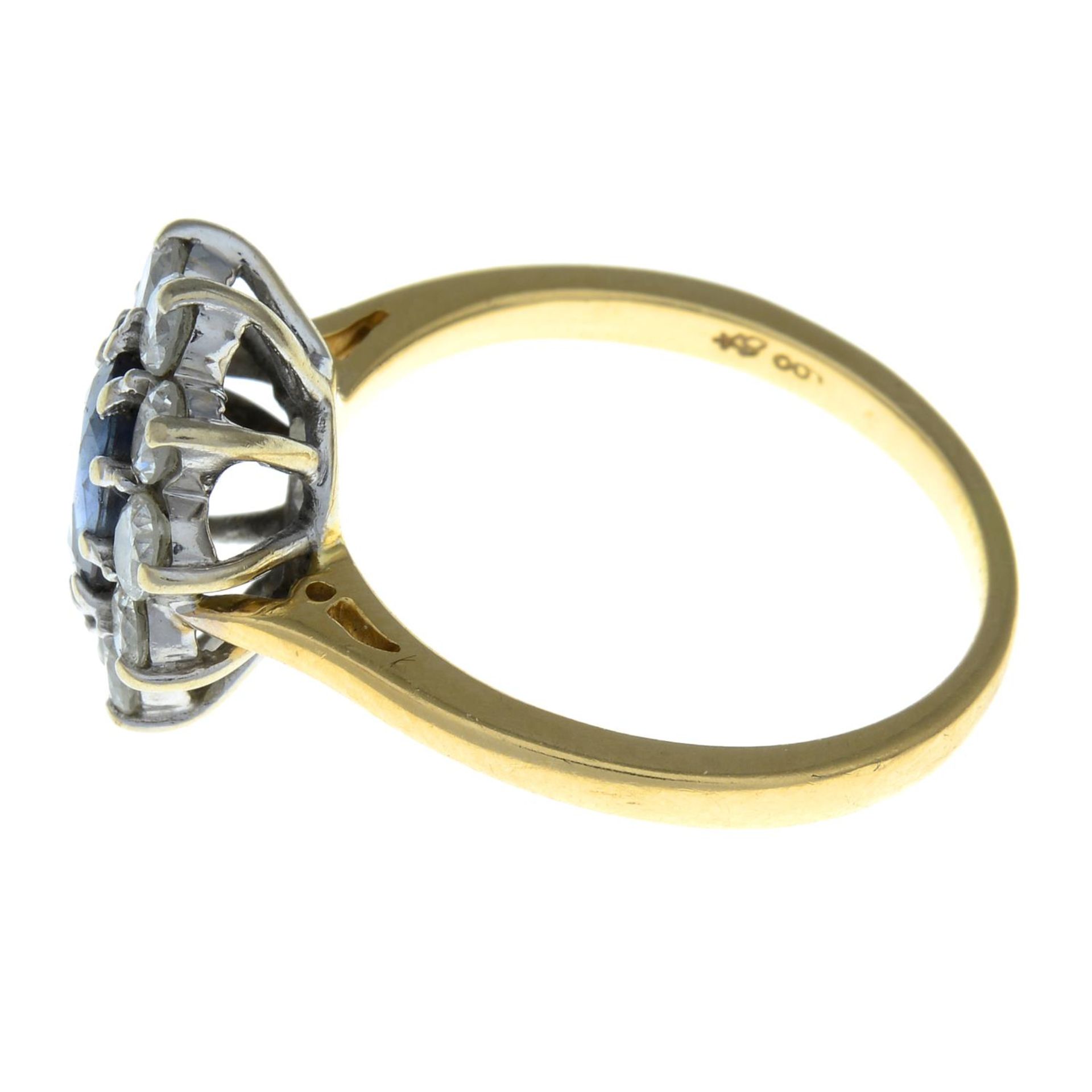 An 18ct gold sapphire and brilliant-cut diamond cluster ring.Estimated total diamond weight 0.80ct, - Image 2 of 3