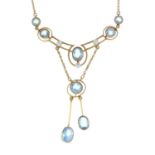 An early 20th century 15ct gold aquamarine and seed pearl drop négligée necklace, by Cropp & Farr.