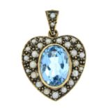 A gold blue topaz and split pearl heart pendant.Hallmarks for Birmingham.Length 3.1cms.