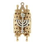 A 9ct gold Torah pendant.
