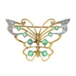 An emerald and diamond openwork butterfly brooch.Estimated total diamond weight 0.10ct.