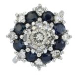 A sapphire and single and brilliant-cut diamond cluster ring.Estimated total diamond weight 0.75ct,