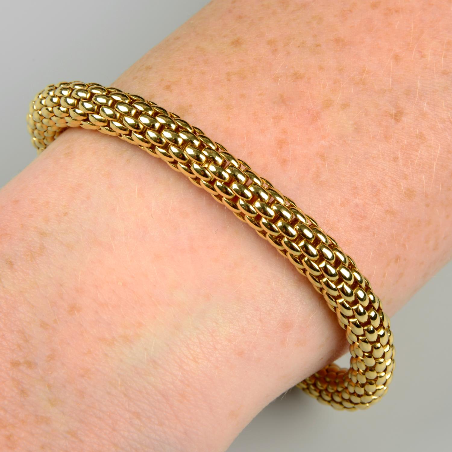 An 18ct gold 'Flex'it' bracelet, by Fope.