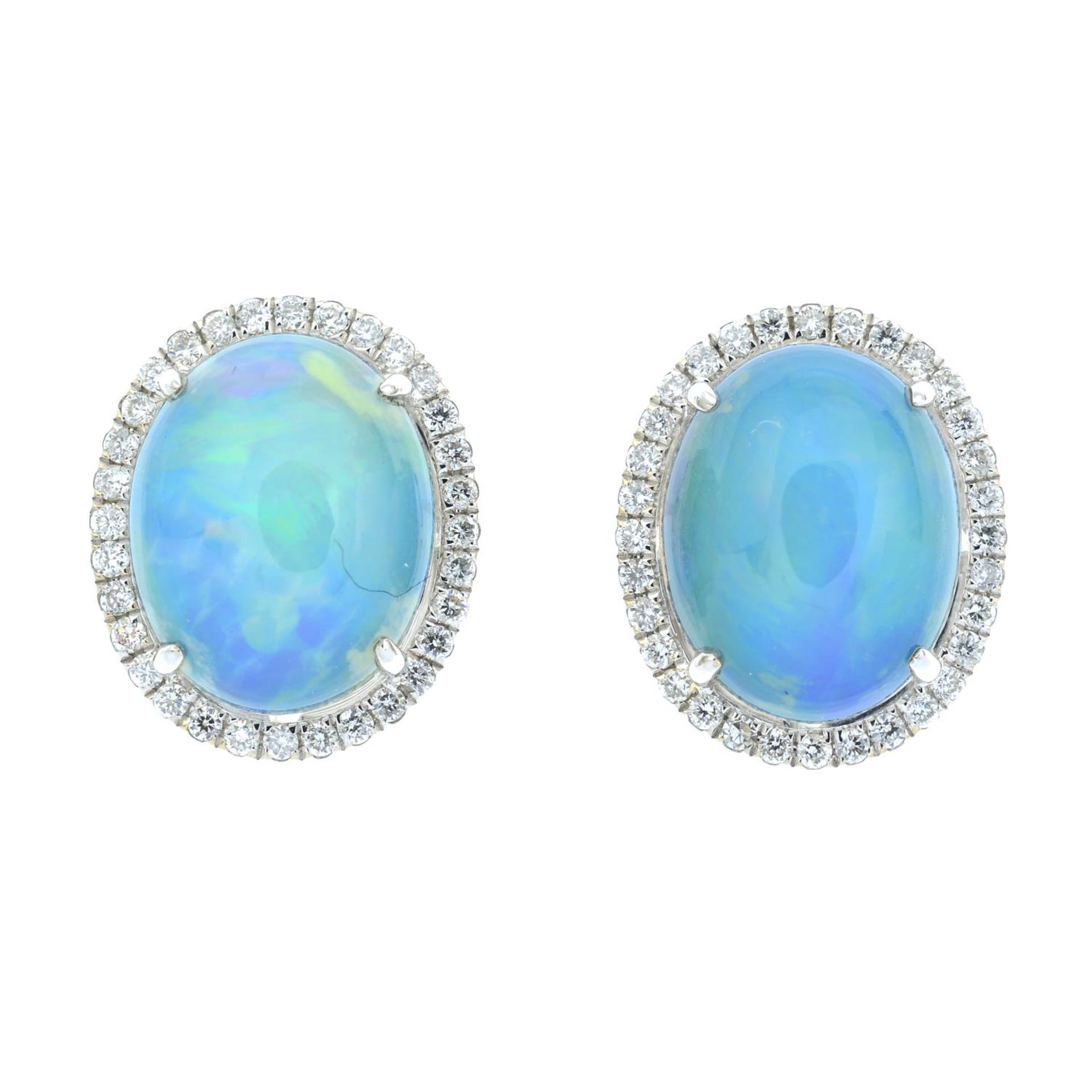 A pair of opal cabochon and brilliant-cut diamond cluster earrings.Total opal weight 3.25cts.Total - Image 2 of 3