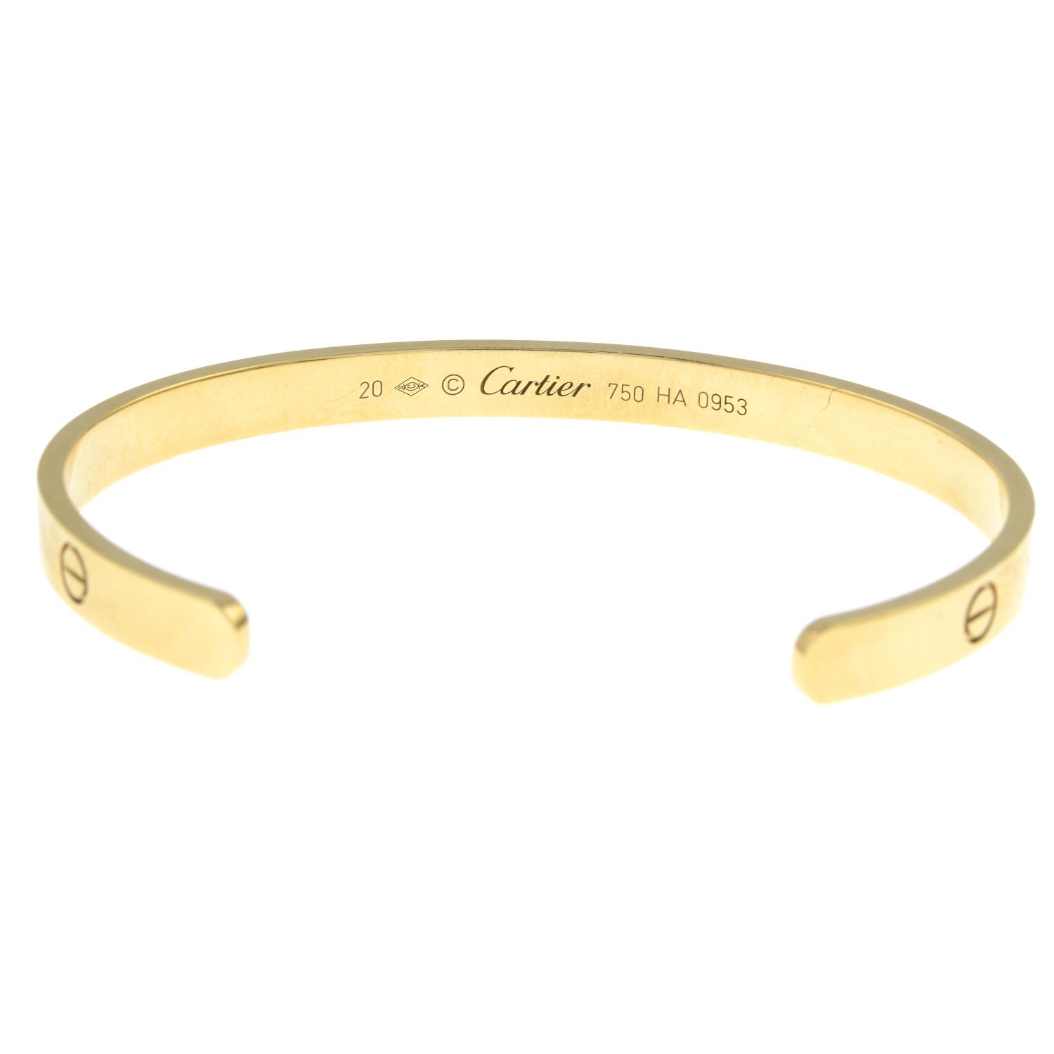 A 'Love' bangle cuff, by Cartier.Stamped 750. - Image 3 of 4