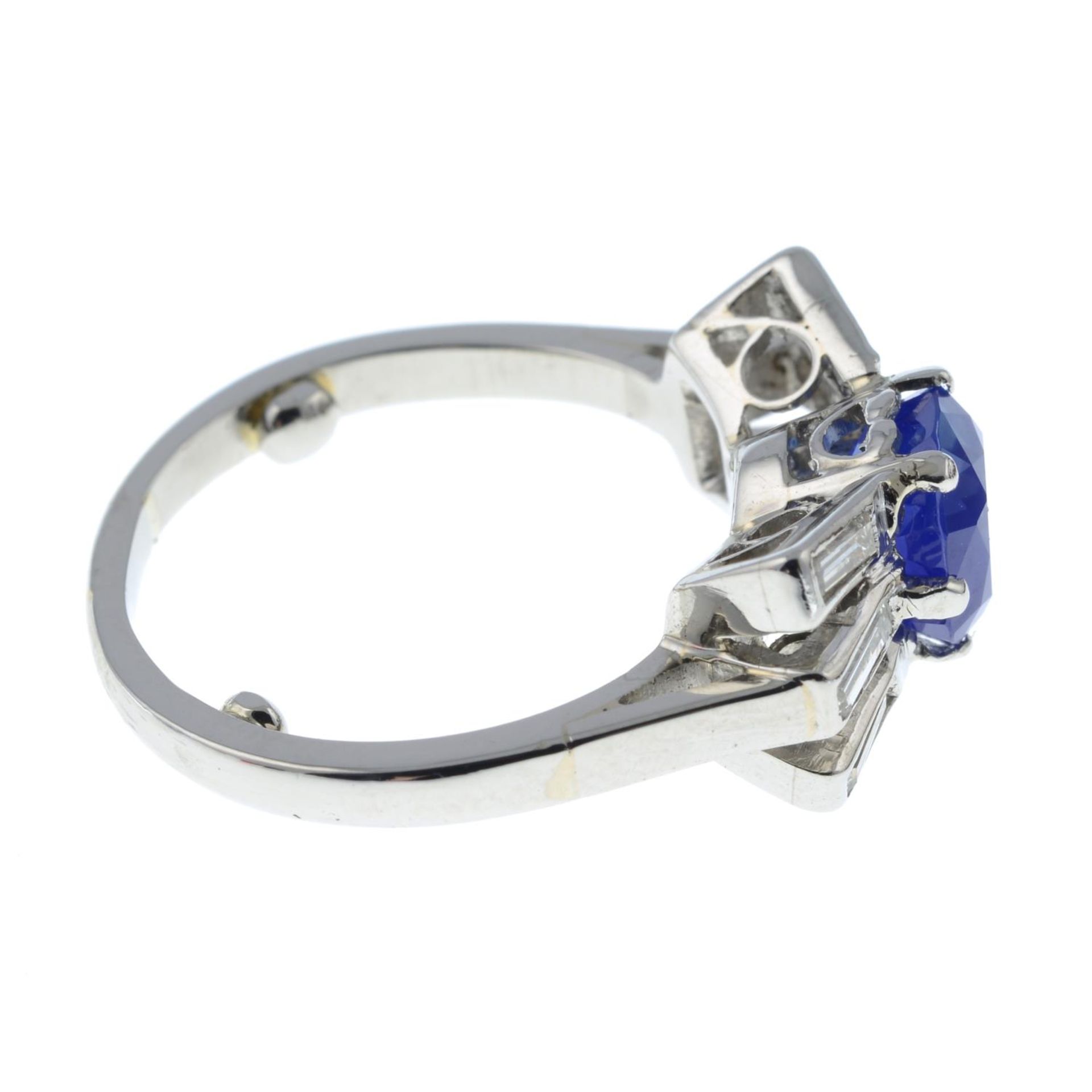 A mid 20th century platinum, Kashmir sapphire and baguette-cut diamond ring. - Image 6 of 7