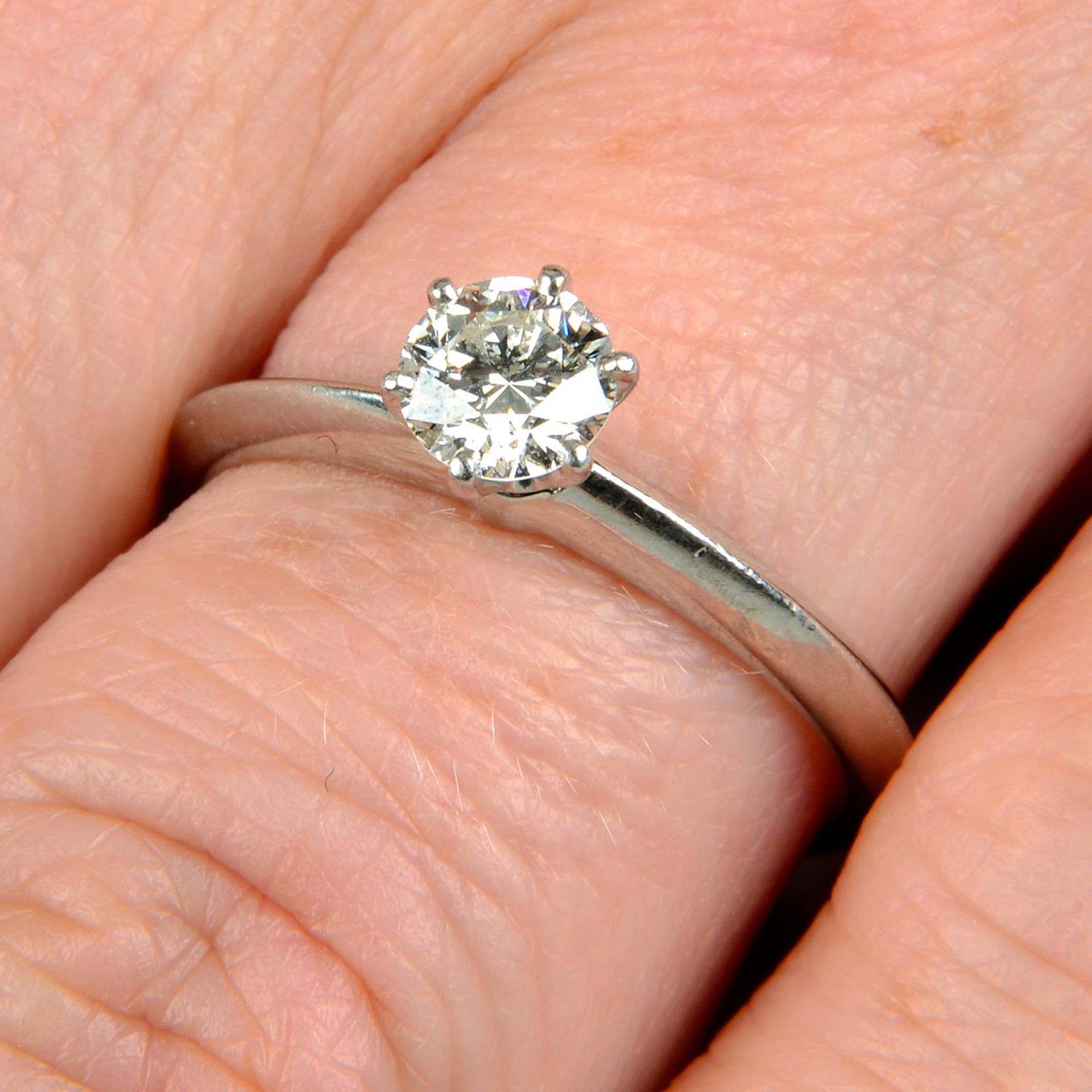 A platinum brilliant-cut diamond single-stone ring, by Tiffany & Co.