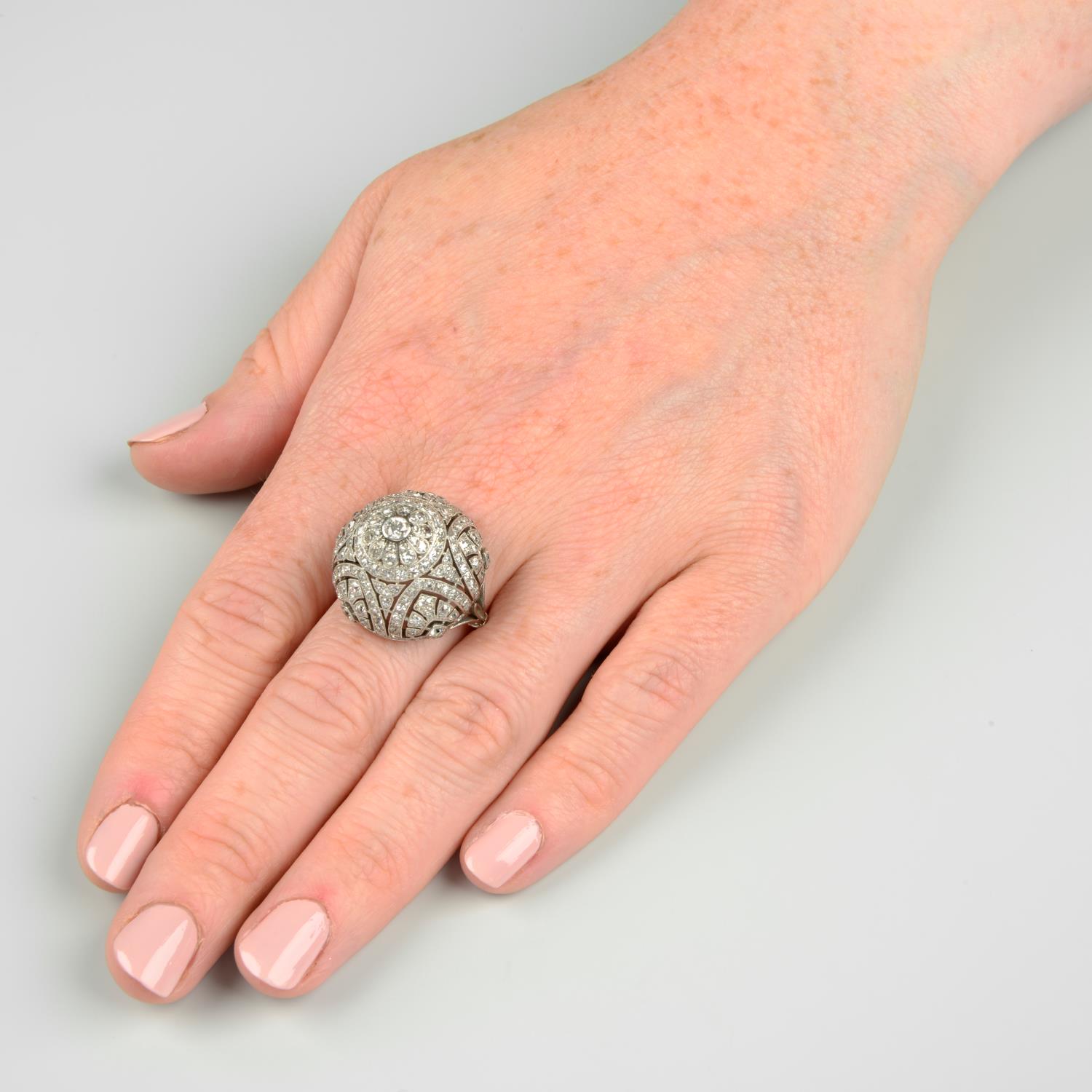 A mid 20th century platinum diamond cocktail ring. - Image 3 of 6