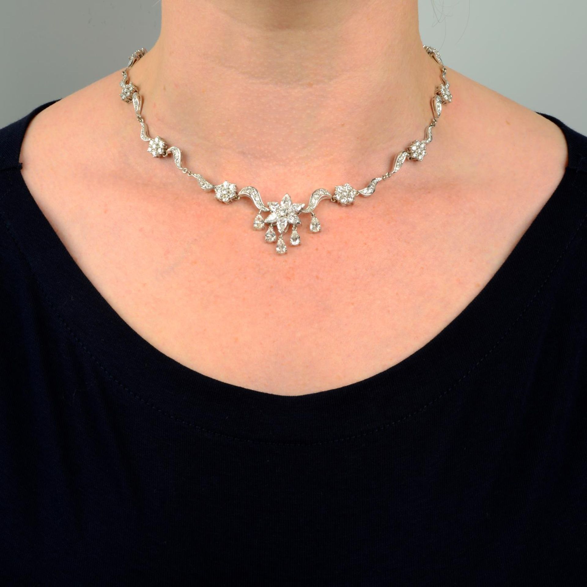 An 18ct gold vari-cut diamond floral necklace.Estimated total diamond weight 8.50 to 9cts, - Image 3 of 5