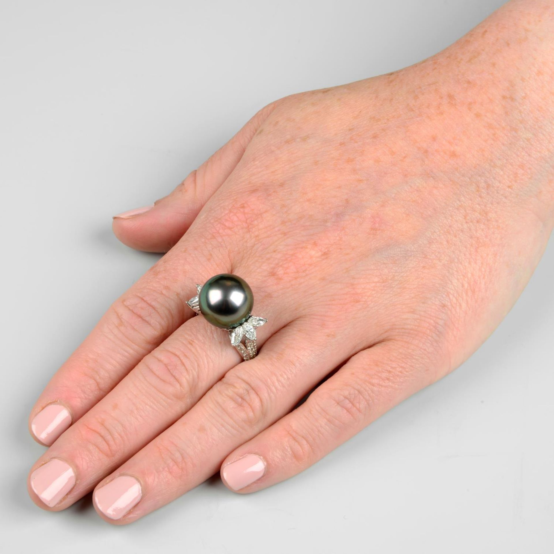 A 'Tahitian' cultured pearl and diamond cocktail ring.Estimated total diamond weight 0.90ct, - Image 3 of 6