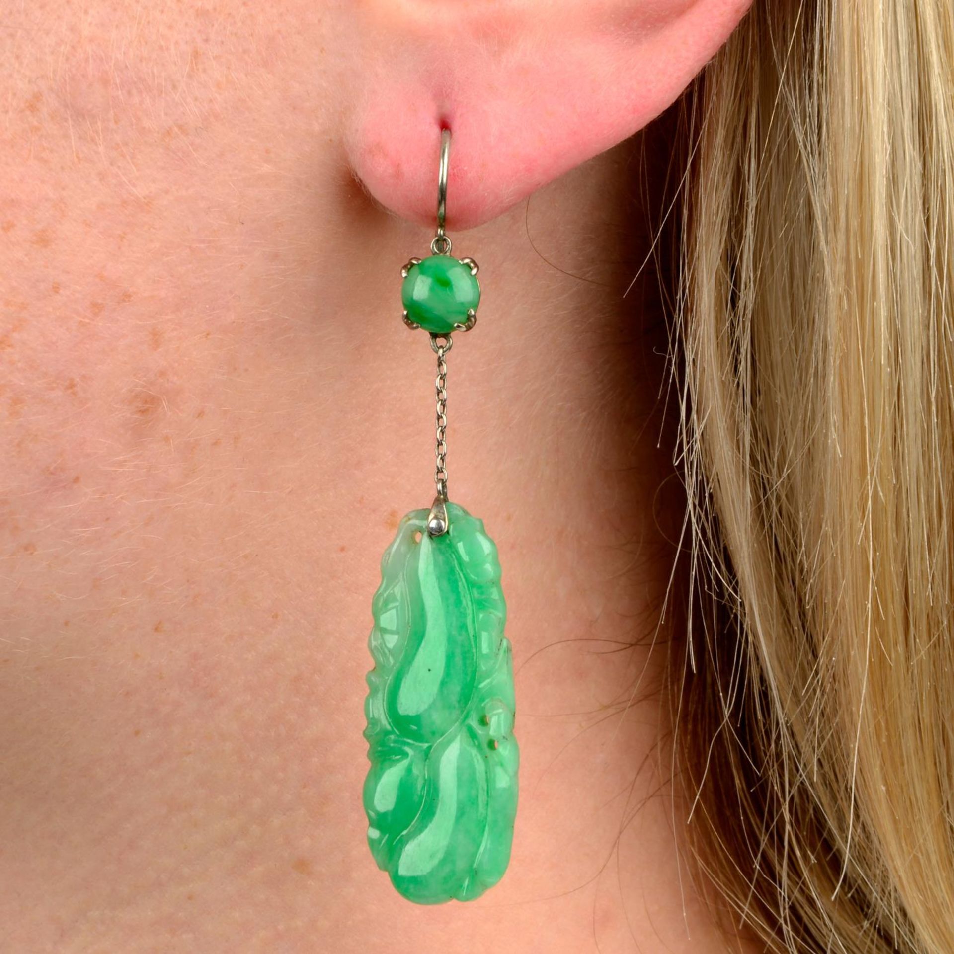 A pair of early 20th century 18ct gold carved A-type jade drop earrings.Verbal from GCS,