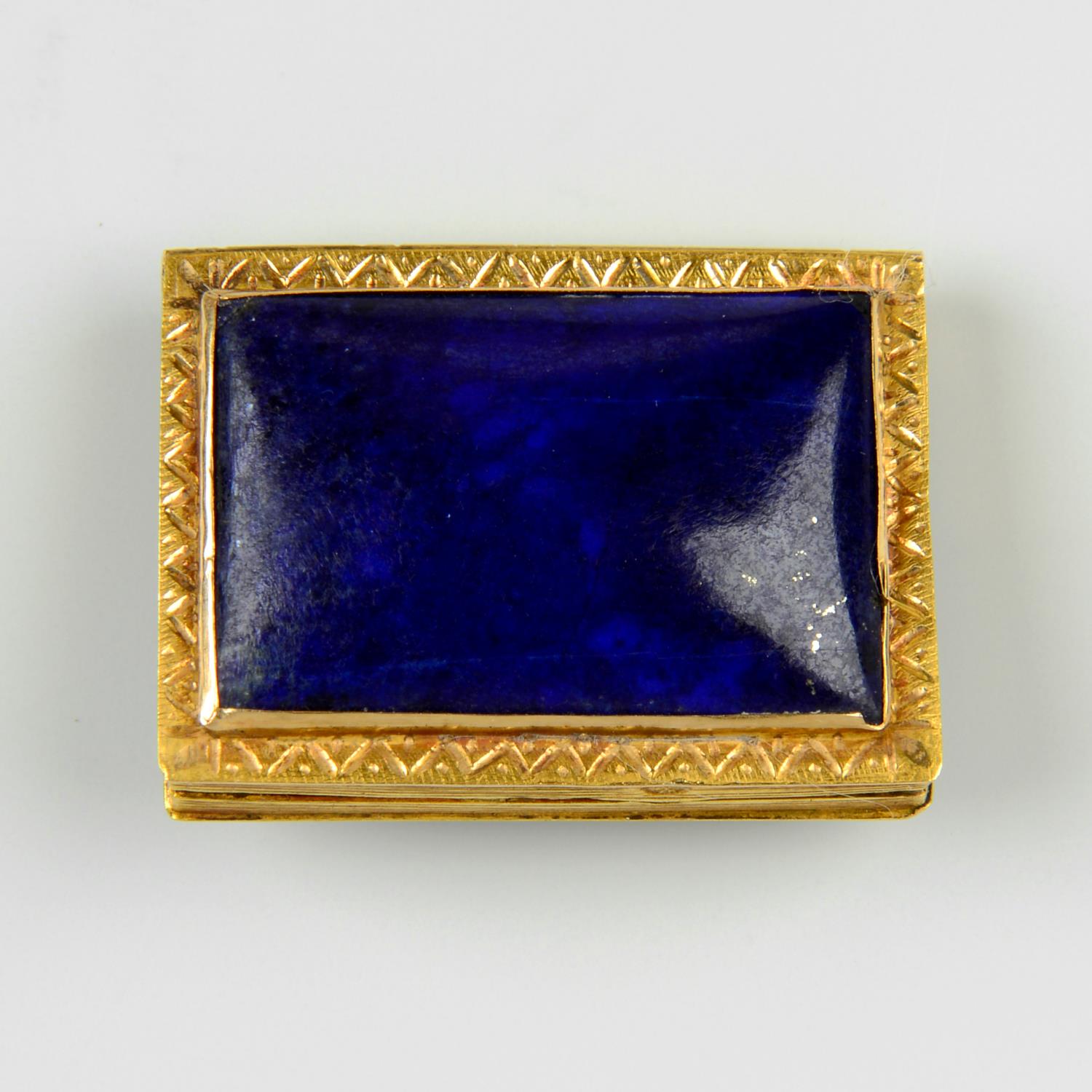 A 19th century gold lapis lazuli vinaigrette, with pierced floral grille.Length 2.6cms.