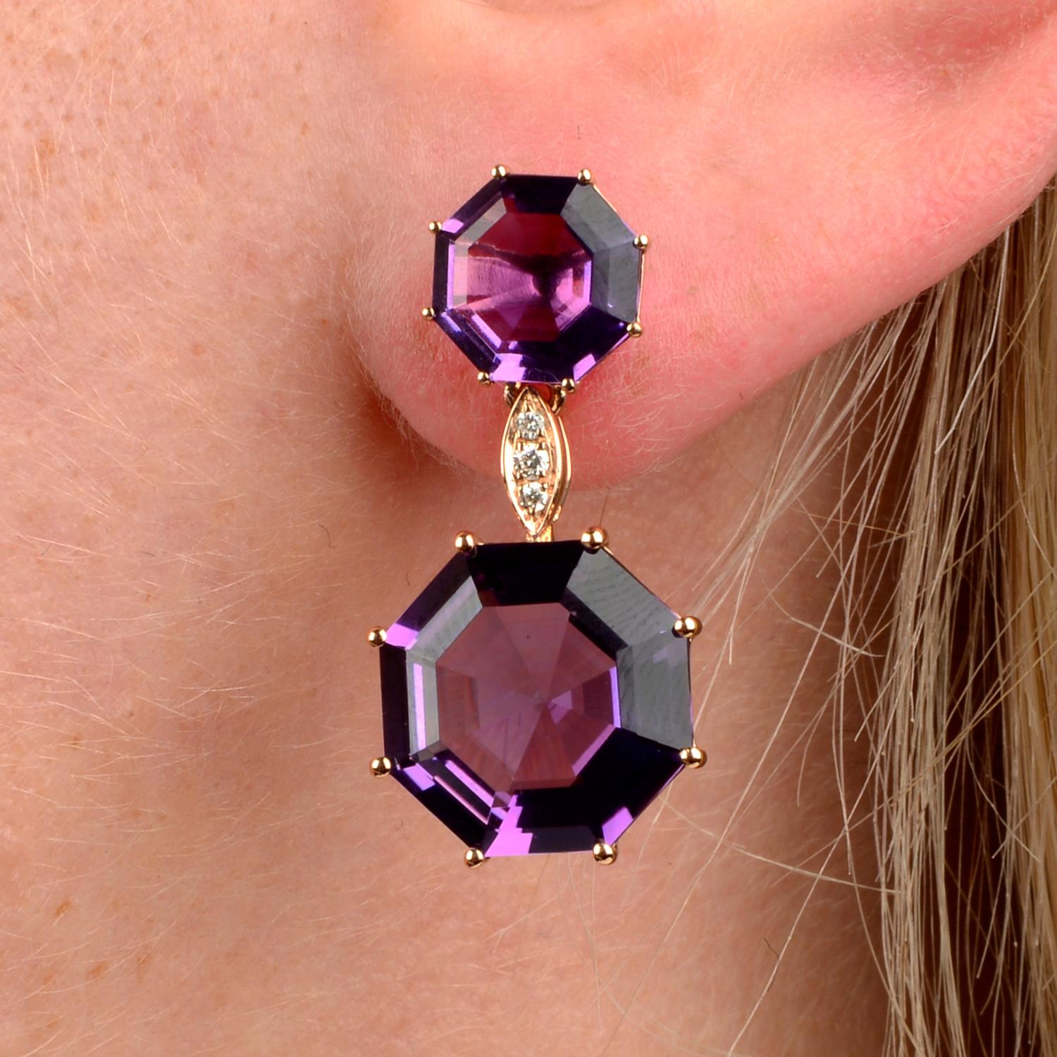 A pair of amethyst and brilliant-cut diamond earrings.Total amethyst weight 12.11cts.