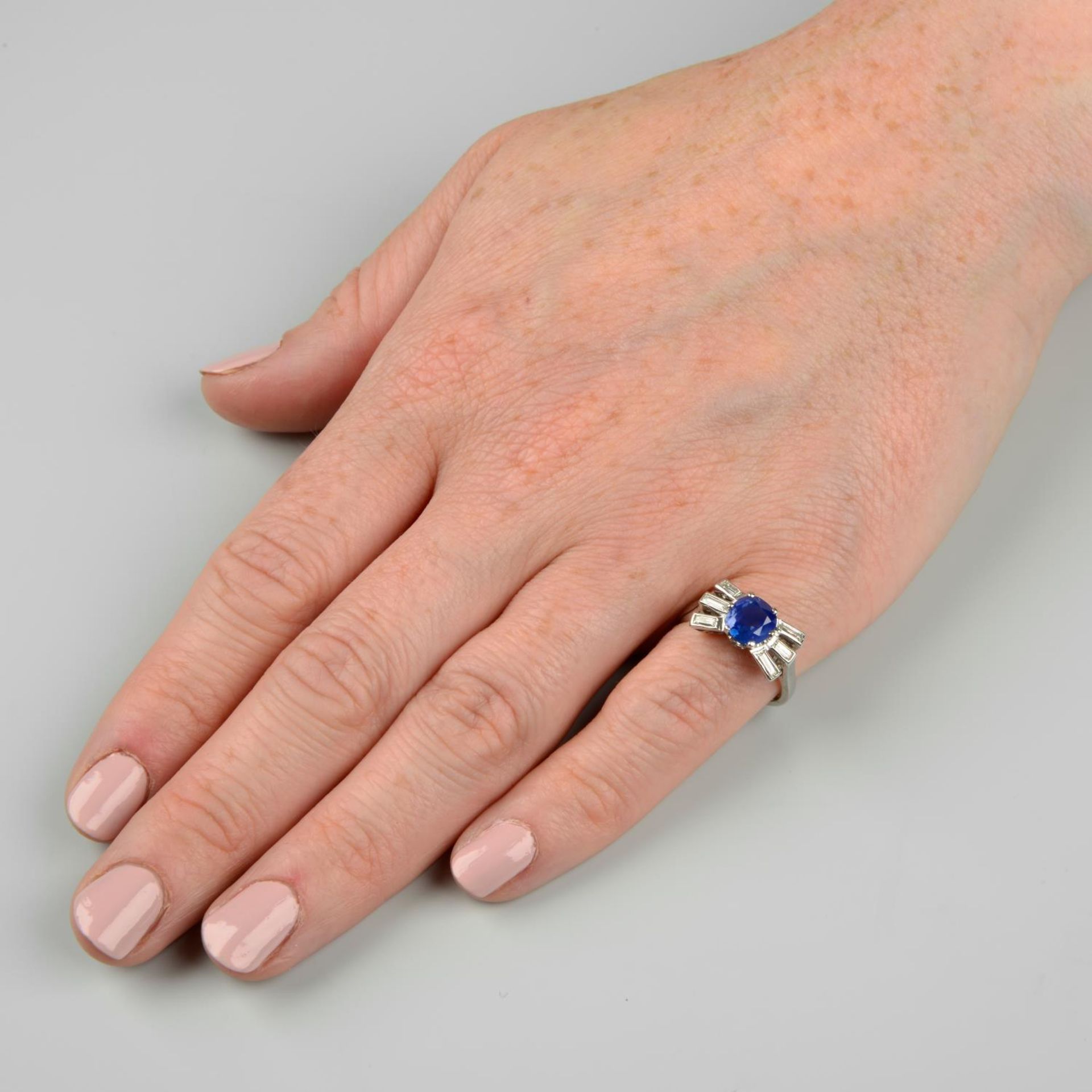 A mid 20th century platinum, Kashmir sapphire and baguette-cut diamond ring. - Image 3 of 7