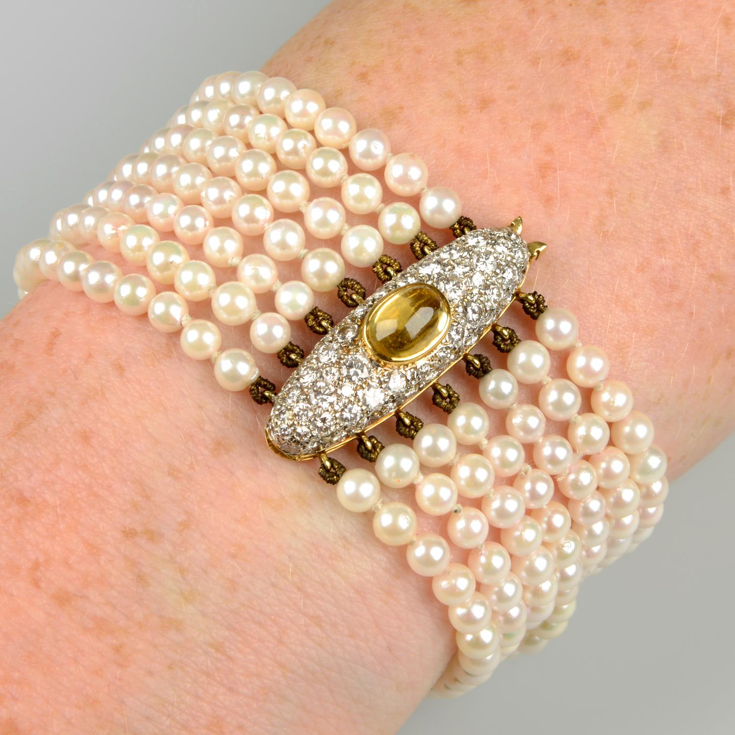 A cultured pearl multi-strand bracelet, with citrine and pavé-set diamond clasp.