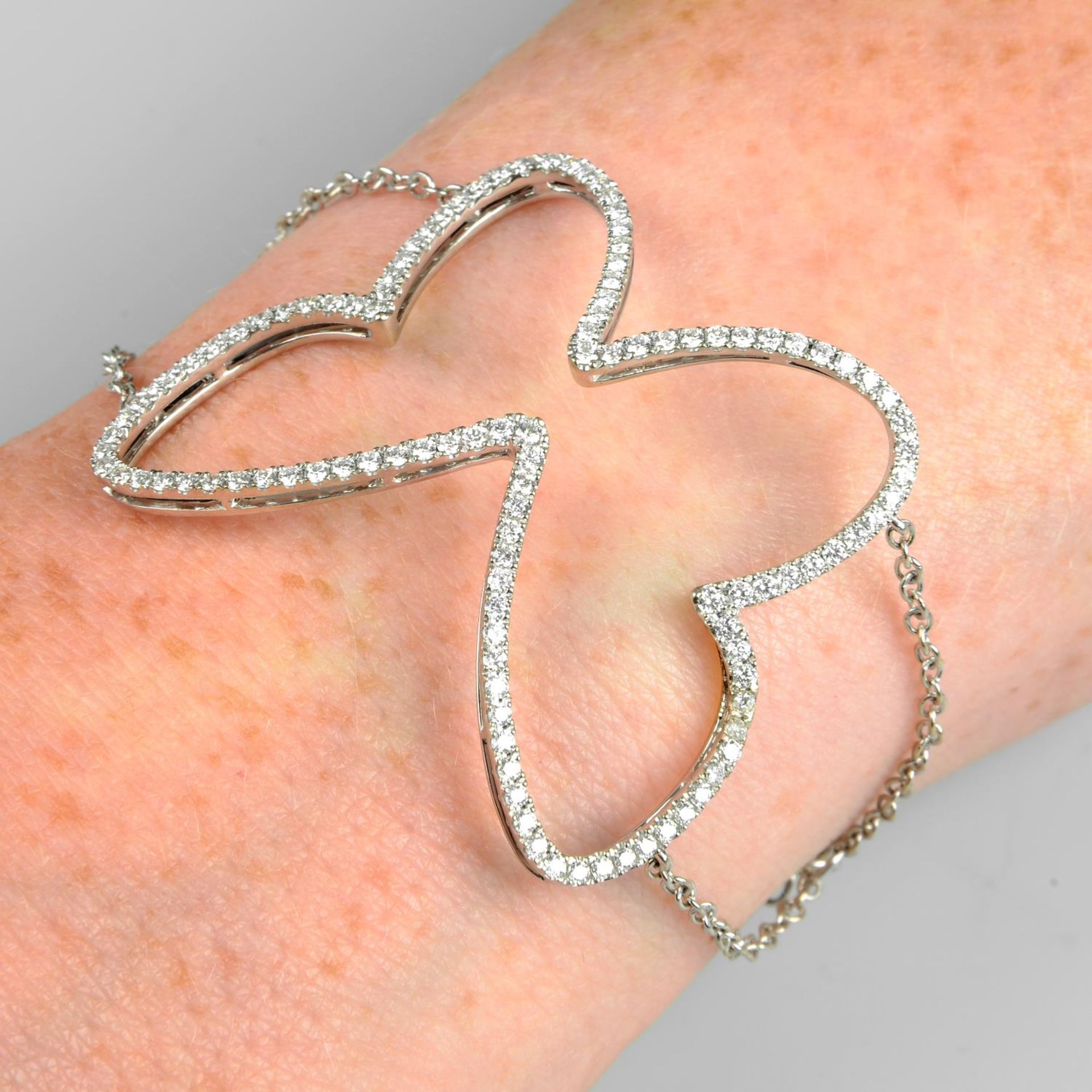 A brilliant-cut diamond butterfly bracelet.Estimated total diamond weight 1ct,