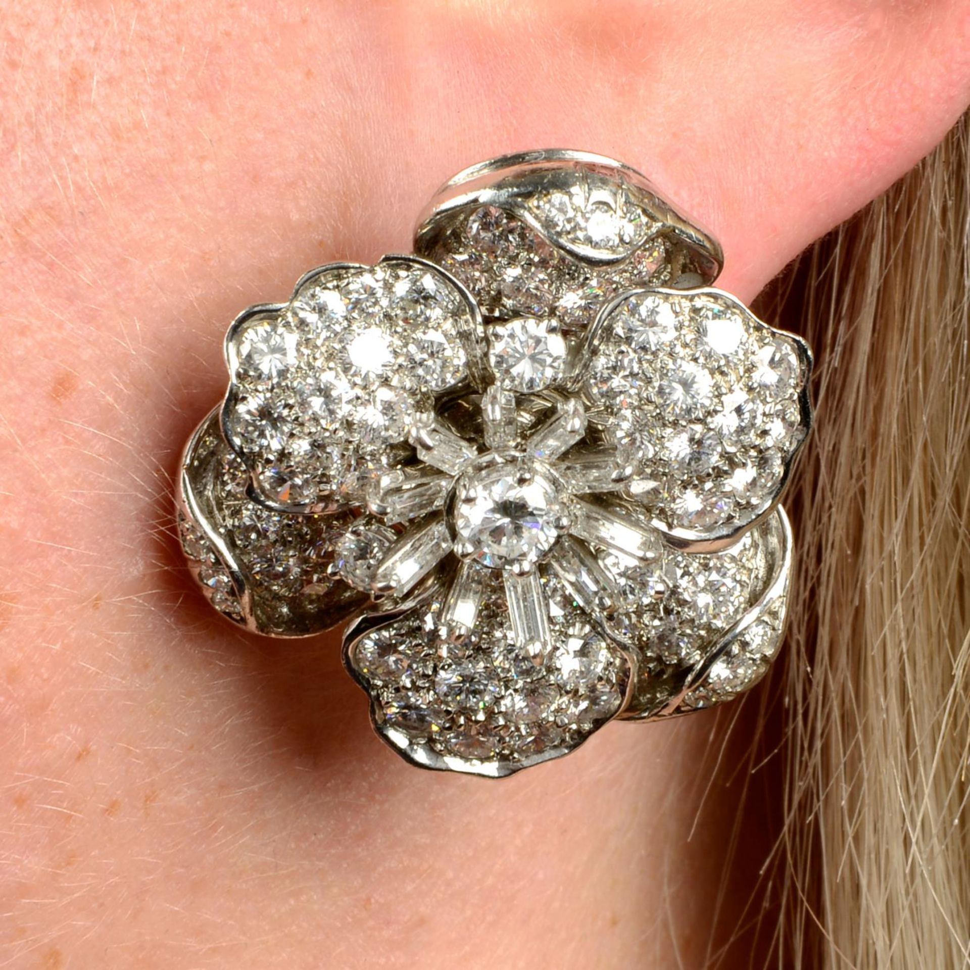 A pair of vari-cut diamond floral earrings,