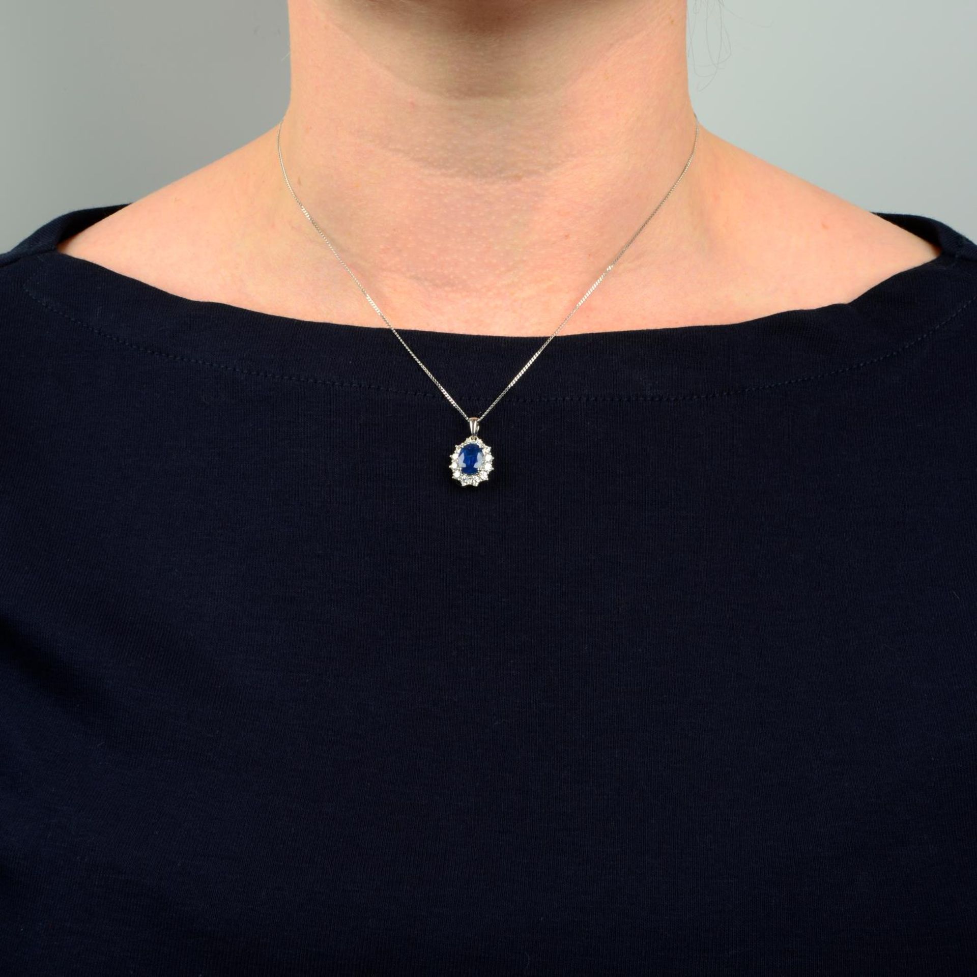 An 18ct gold sapphire and brilliant-cut diamond cluster pendant, - Image 3 of 5