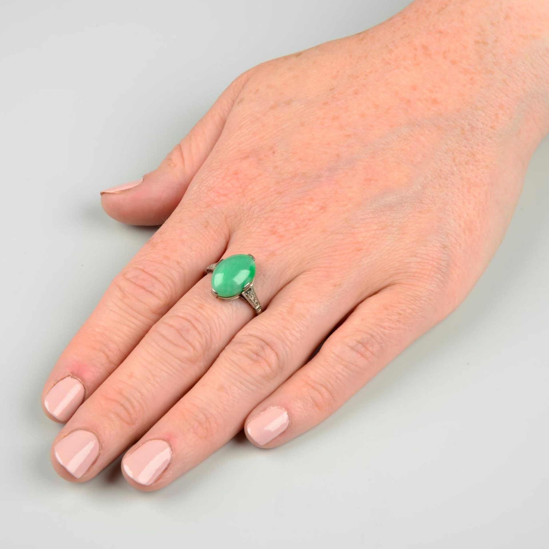 An Art Deco platinum and 18ct gold A-type jade cabochon and diamond ring.Verbal from GCS, - Image 3 of 6