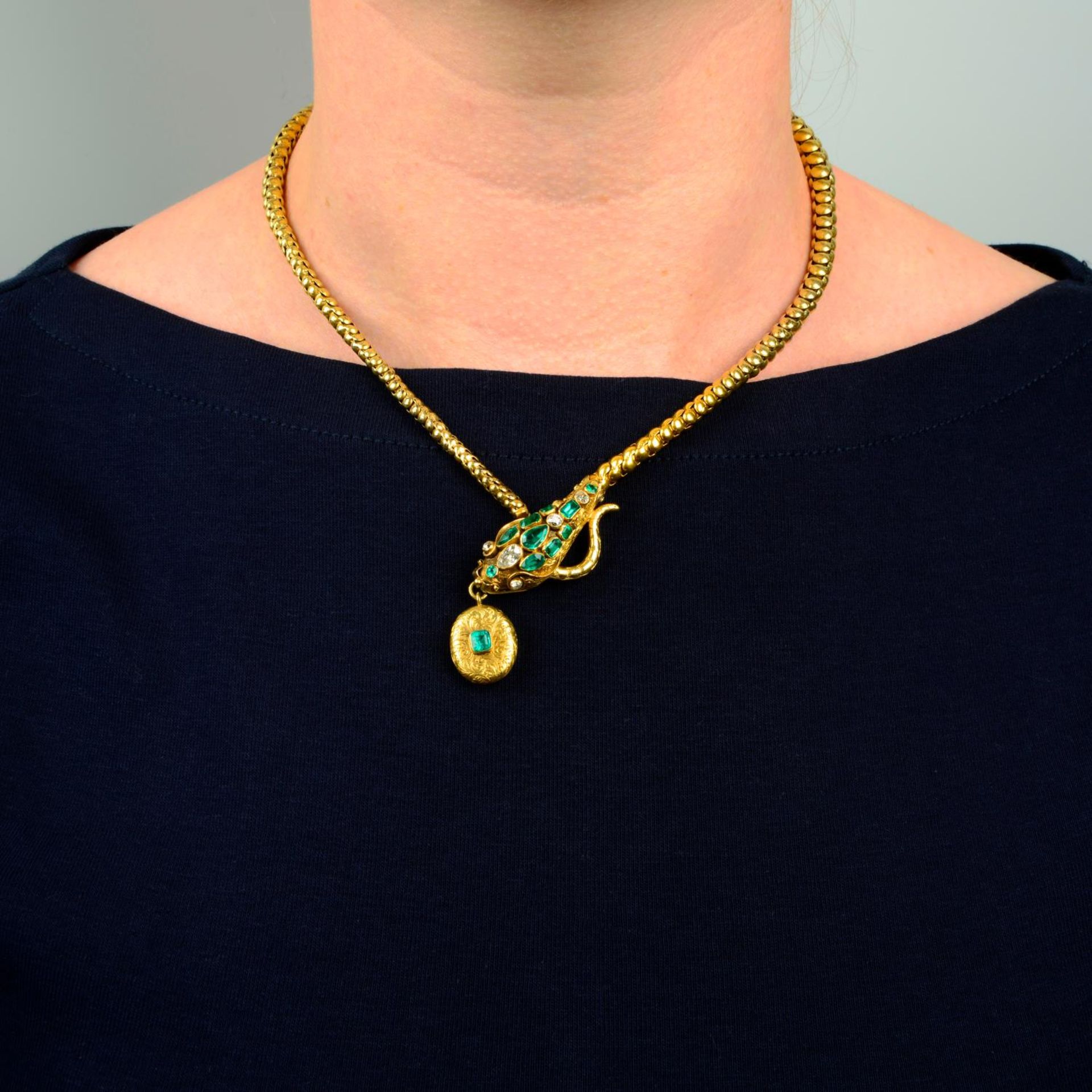 A mid 19th century gold emerald and diamond snake necklace.Estimated total diamond weight 0.50ct, - Image 3 of 5
