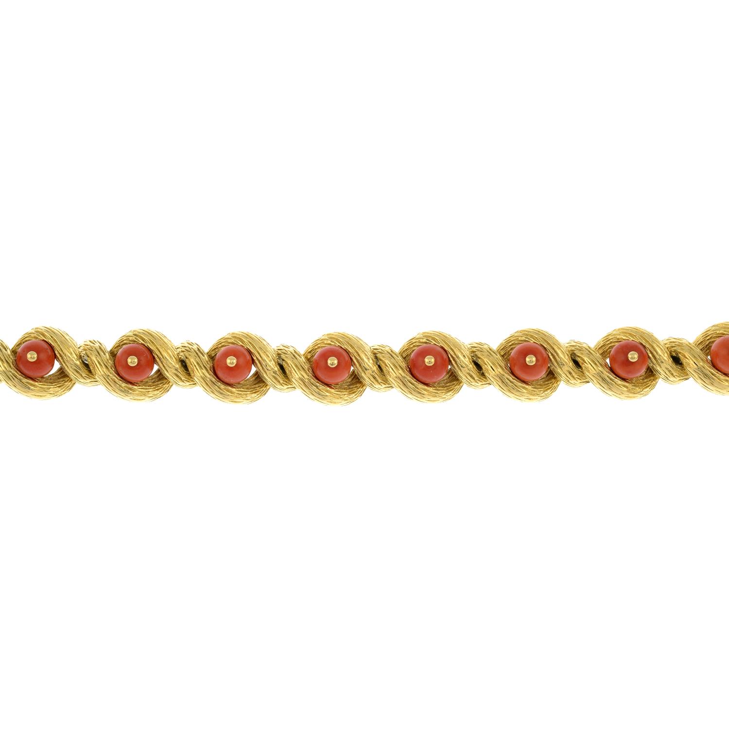 A mid 20th century 18ct gold coral and textured gold bracelet, by Cartier.Stamped 18Kts. - Image 2 of 4