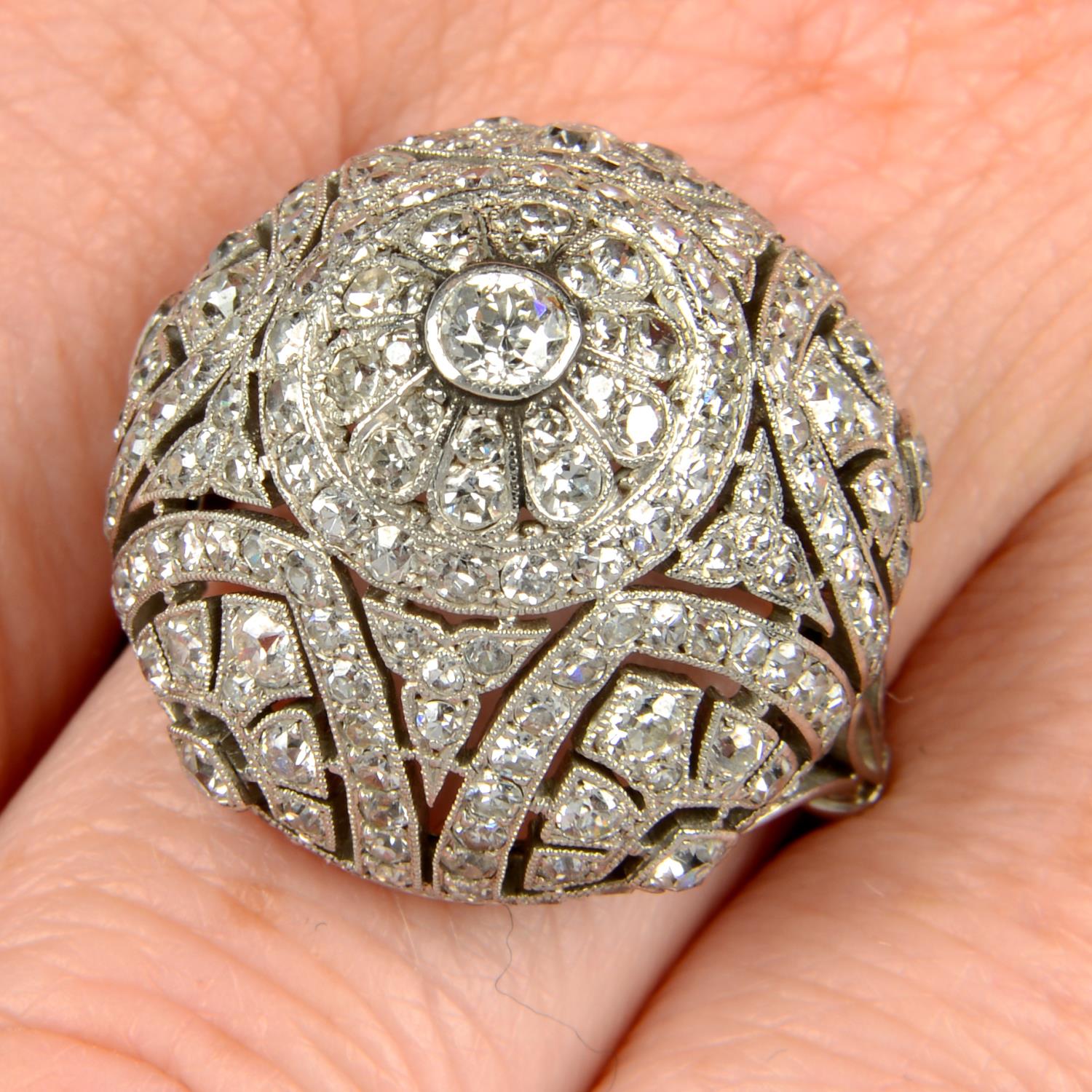 A mid 20th century platinum diamond cocktail ring.