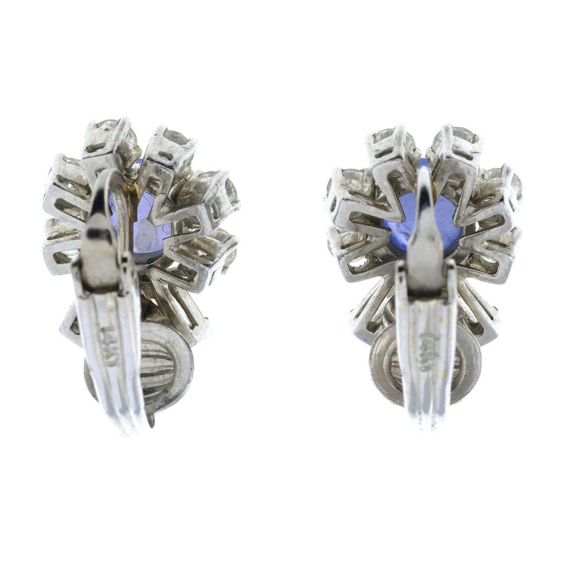 A pair of star sapphire and vari-cut diamond cluster earrings. - Bild 3 aus 4