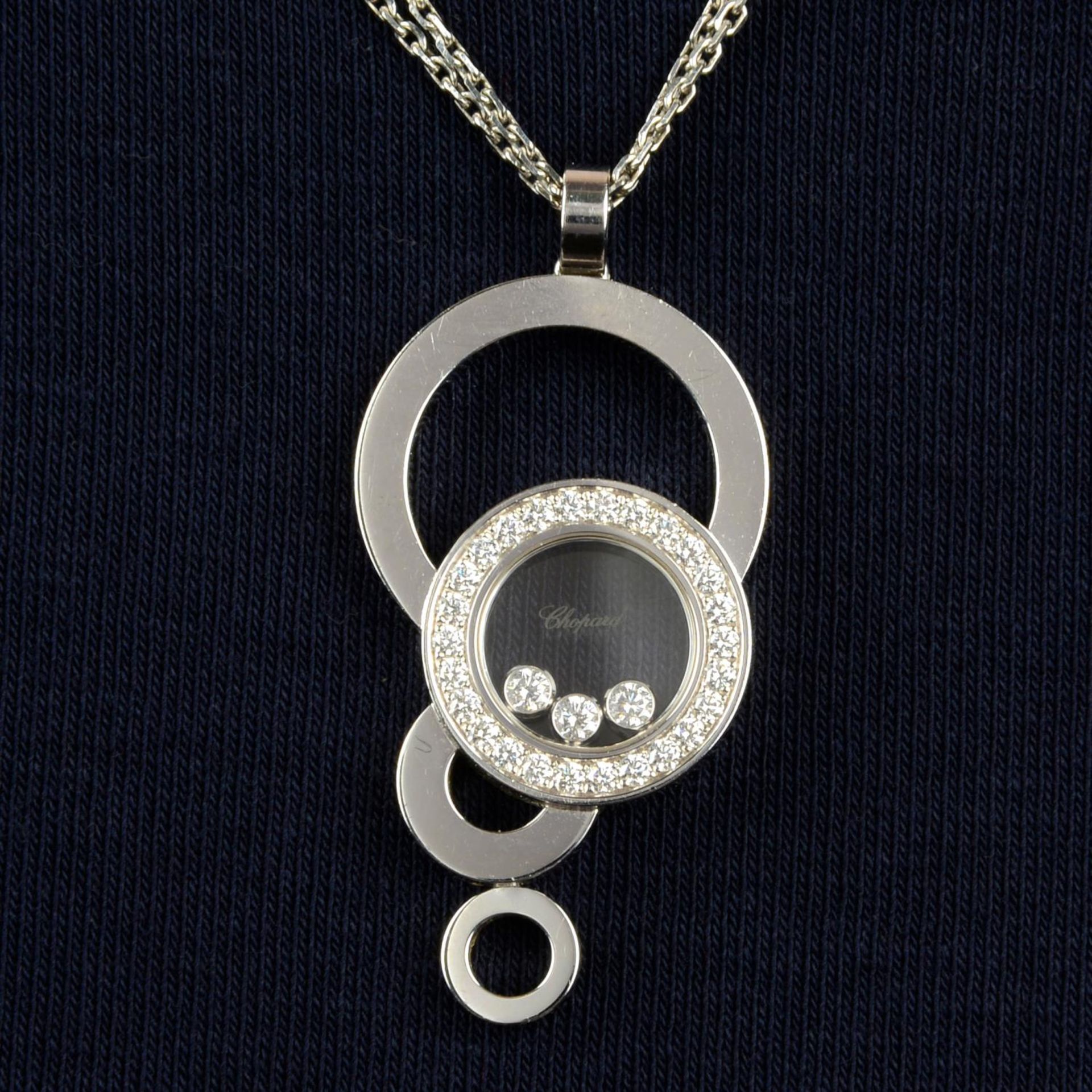 An 18ct gold diamond 'Happy Bubbles' pendant, with chain, by Chopard.