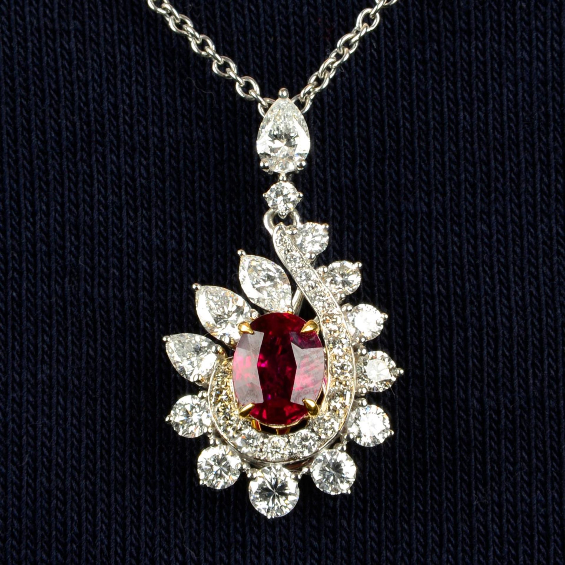 A 'Pigeon's Blood' Burmese ruby and vari-cut diamond cluster pendant,