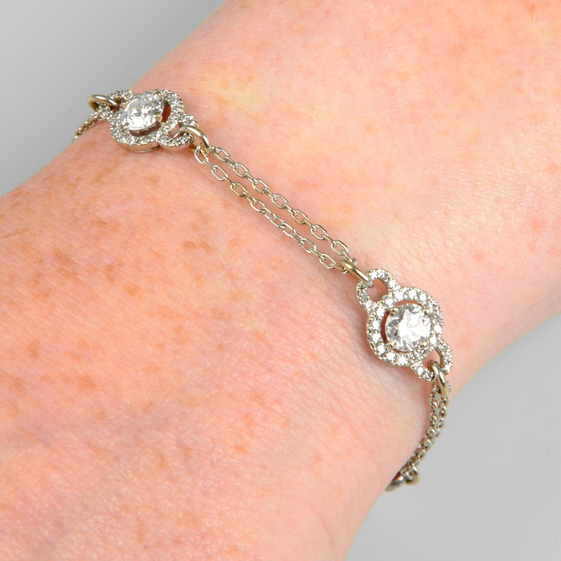 A brilliant-cut diamond cluster bracelet.Estimated total diamond weight 3cts,