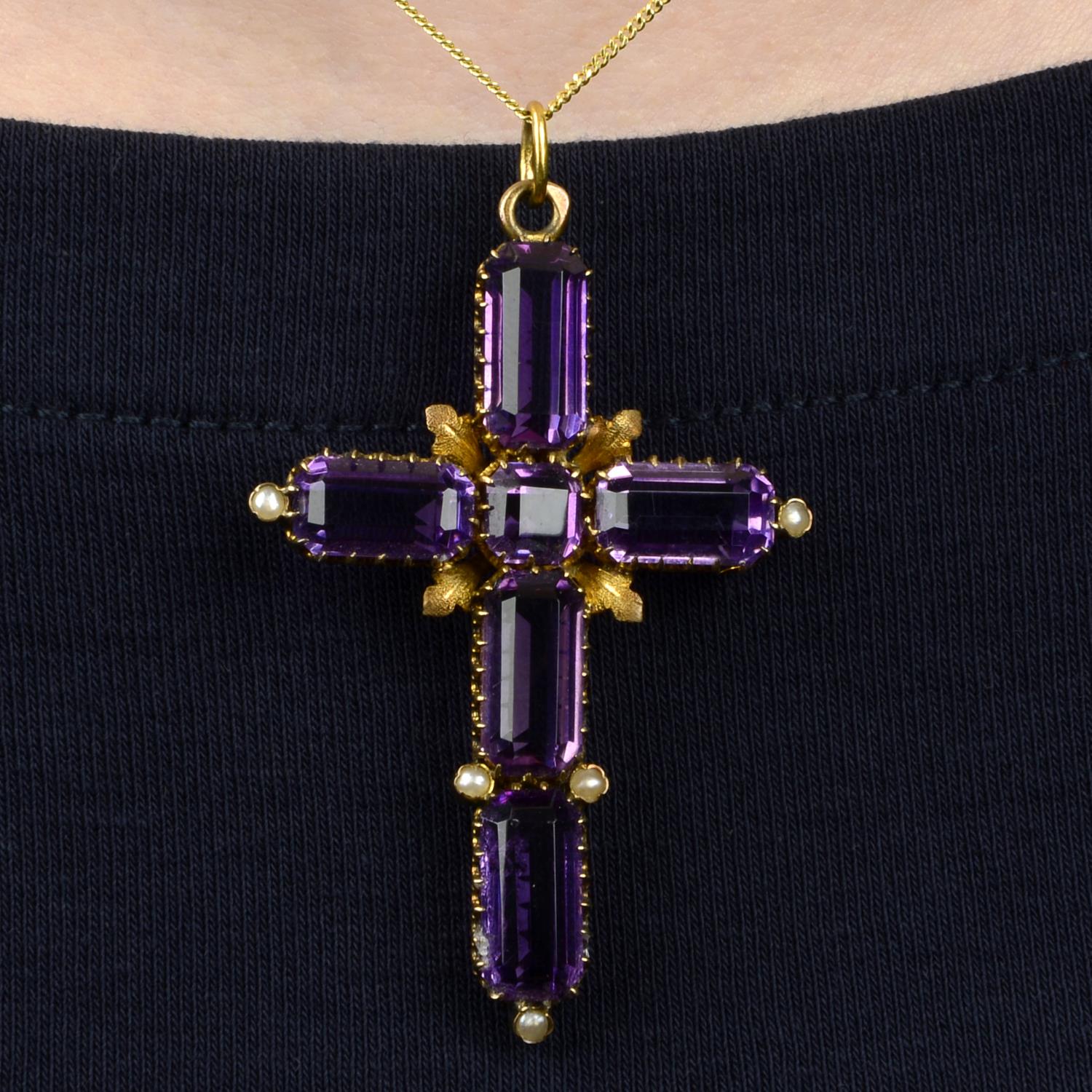 A late 19th century gold amethyst and split pearl cross pendant.Austrian marks, indistinct.