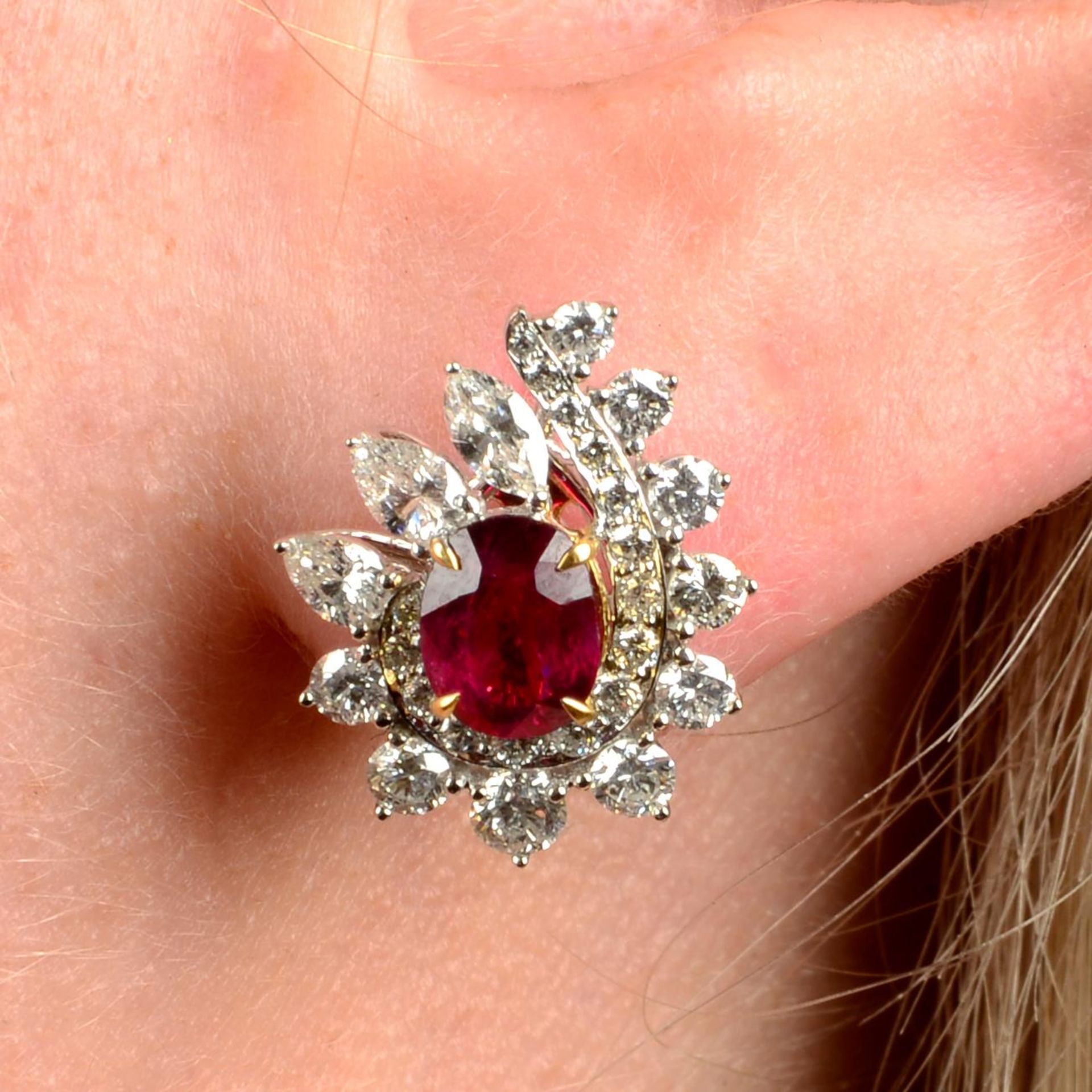 A pair of 'Pigeon's Blood' Burmese ruby and vari-cut diamond earrings.With reports from GRS,