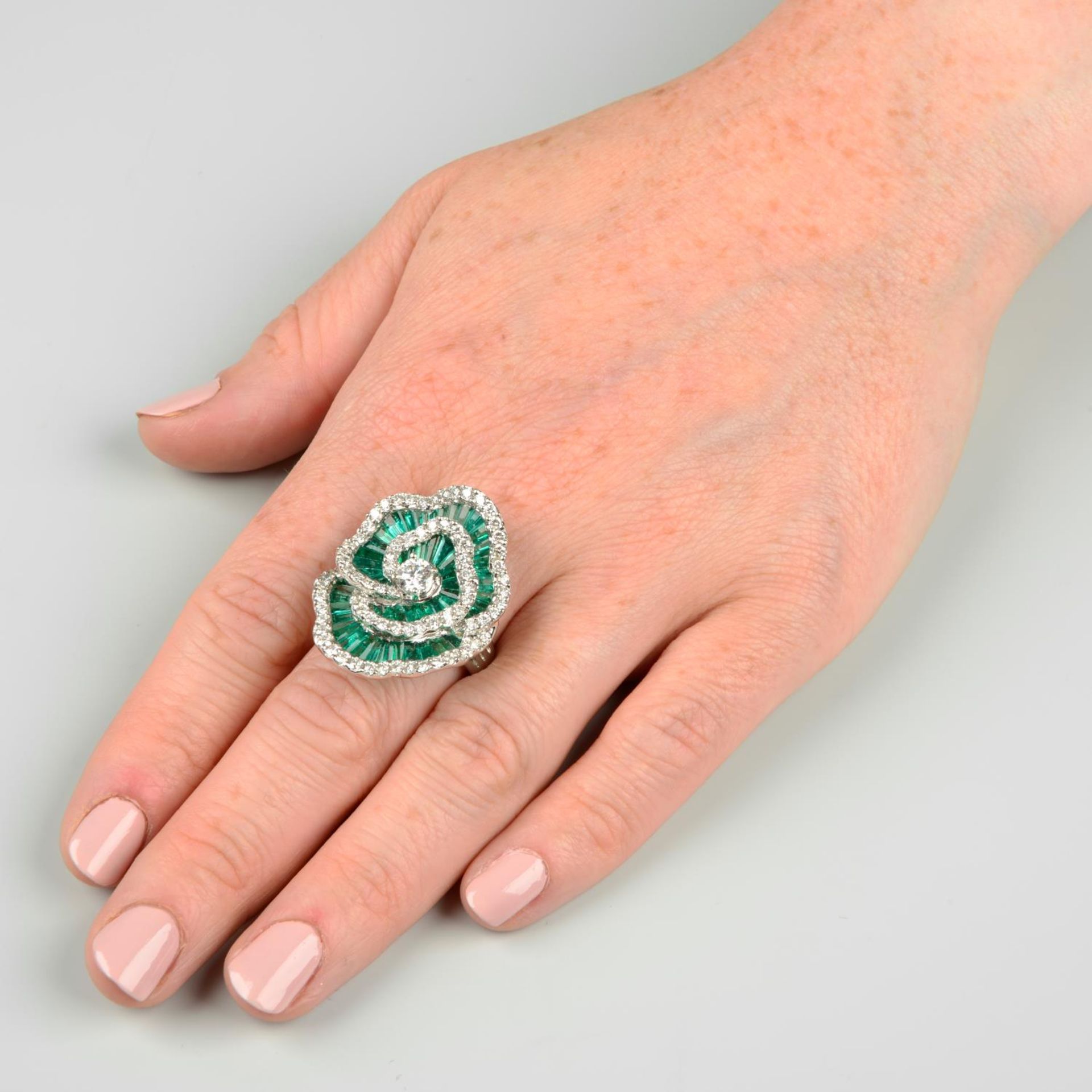 An emerald and diamond floral cocktail ring. - Image 3 of 6