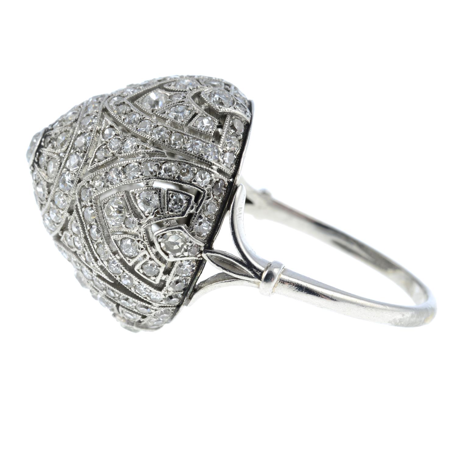 A mid 20th century platinum diamond cocktail ring. - Image 4 of 6