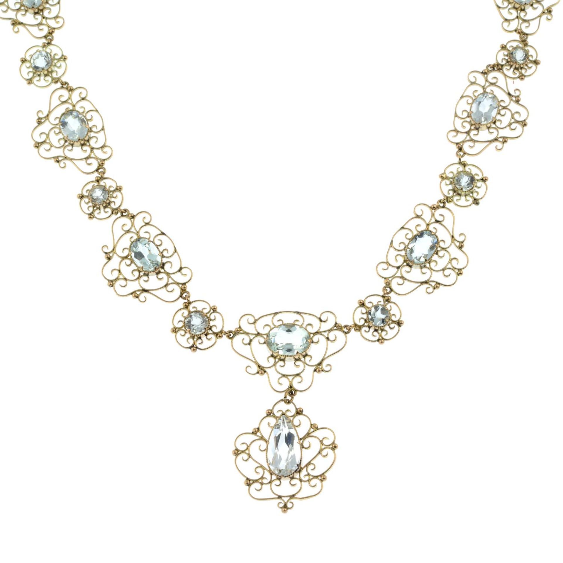 An early 20th century Arts & Crafts gold aquamarine necklace.Length 43.5cms. - Image 2 of 6