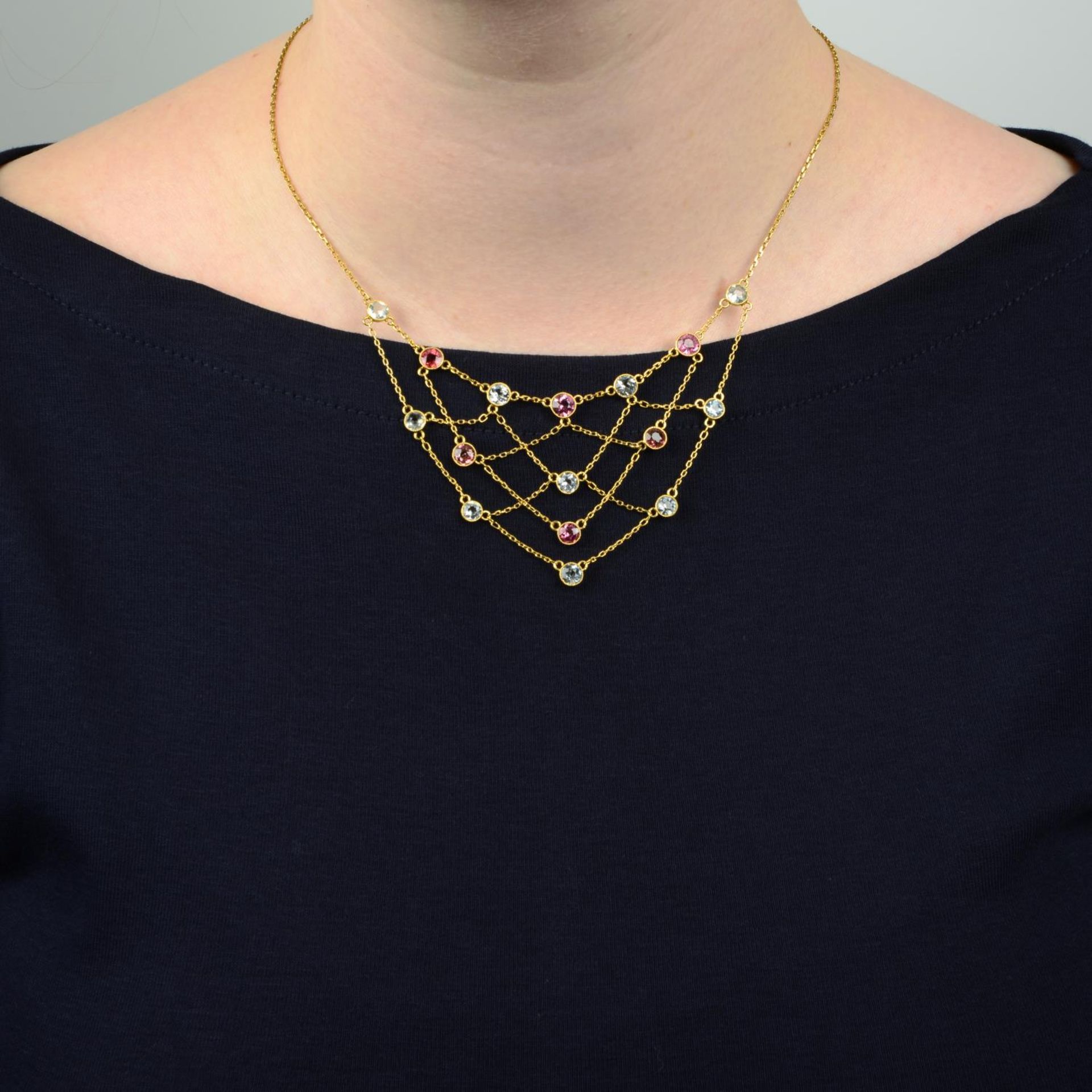 An early 20th century 18ct gold pink tourmaline and aquamarine lattice necklace.Stamped 18. - Image 3 of 5