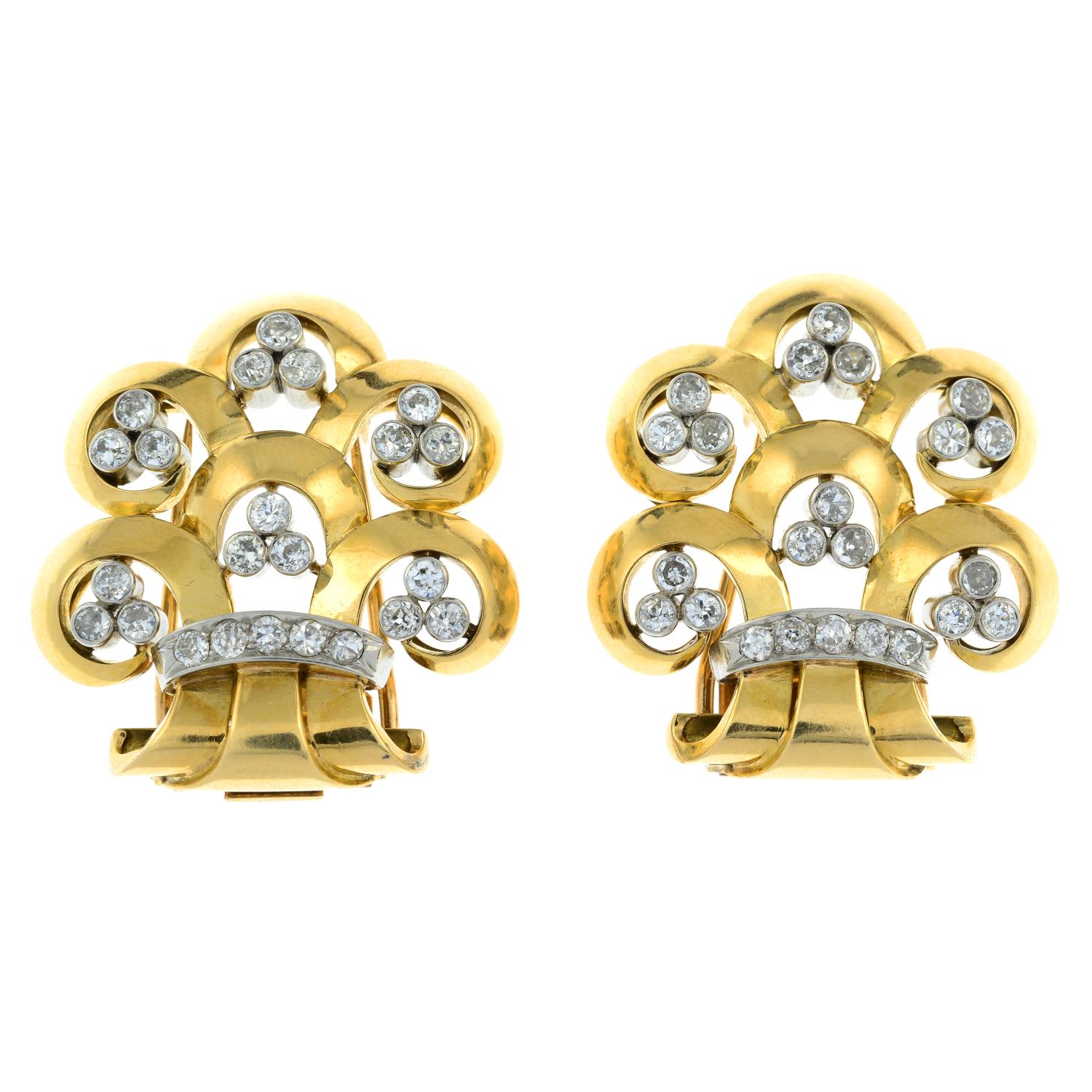 A pair of 1940s gold circular-cut diamond stylised floral clips.Estimated total diamond weight - Image 2 of 4