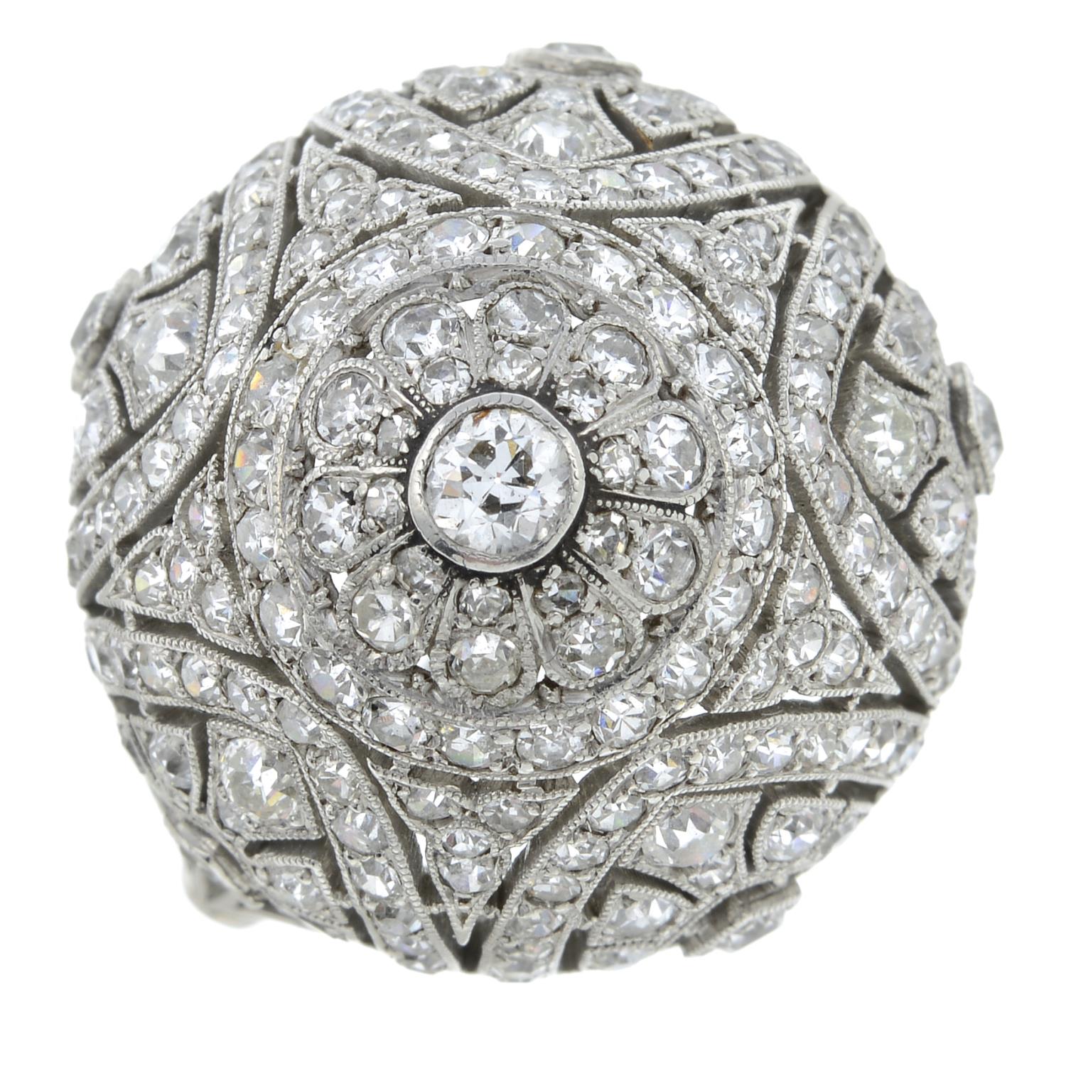 A mid 20th century platinum diamond cocktail ring. - Image 2 of 6