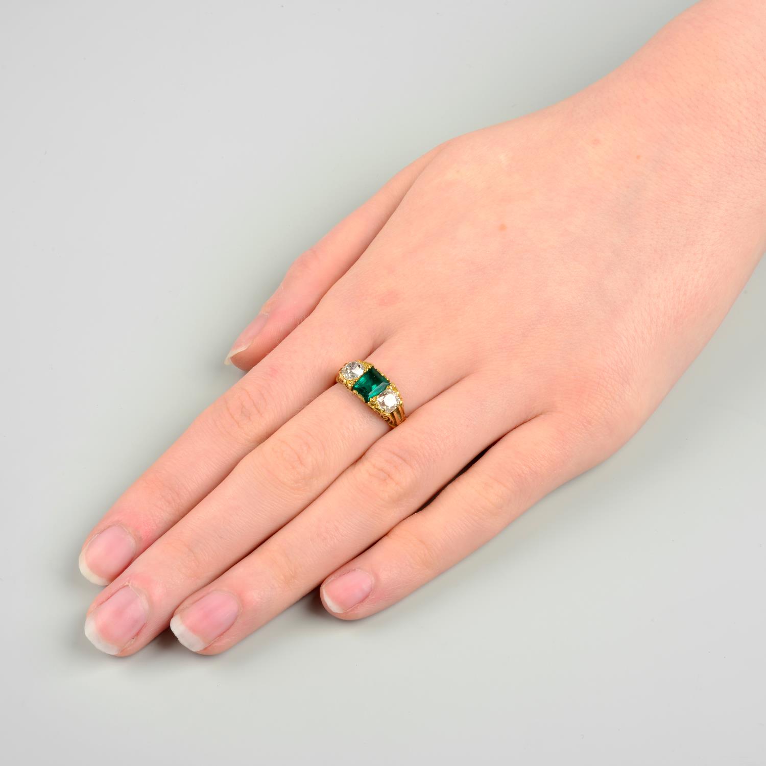 A late Victorian 18ct gold Colombian emerald and old-cut diamond three-stone ring.Verbal from GCS, - Image 3 of 8