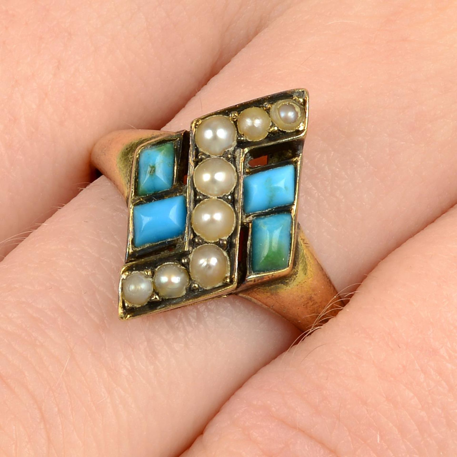 A late Victorian 15ct gold turquoise and split pearl ring.Ring size P.