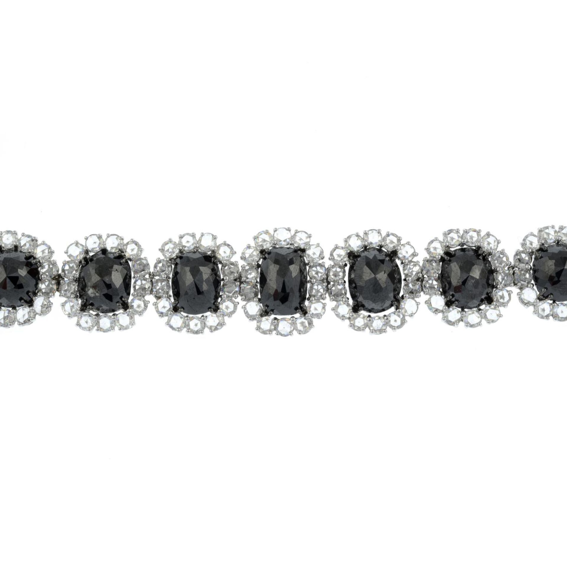A slightly graduated 'black' diamond and rose-cut diamond cluster bracelet.Estimated dimensions of - Bild 2 aus 4